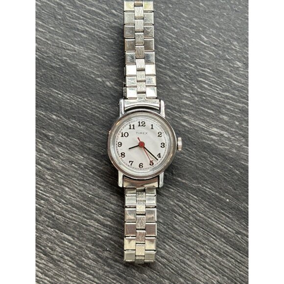 VTG Timex mechanical w/ a stainless mesh bracelet a white dial w/Arabic numerals